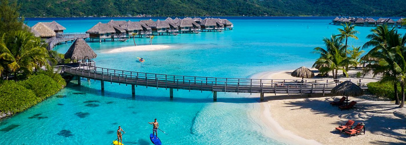 two people paddleboarding InterContinental Bora Bora Resort & Thalasso Spa